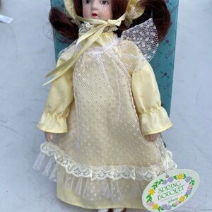 Spring Bouquet Porcelain dressed Yellow Doll 8 inch.